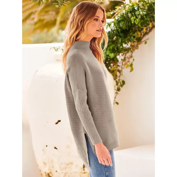 imageANRABESS Womens Turtleneck Oversized Long Batwing Sleeve High Low Spilt Hem Knit Pullover Sweater TopsAlmond
