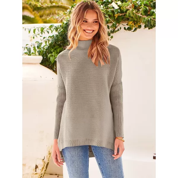 imageANRABESS Womens Turtleneck Oversized Long Batwing Sleeve High Low Spilt Hem Knit Pullover Sweater TopsAlmond