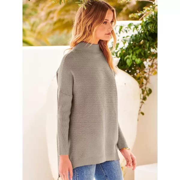imageANRABESS Womens Turtleneck Oversized Long Batwing Sleeve High Low Spilt Hem Knit Pullover Sweater TopsAlmond