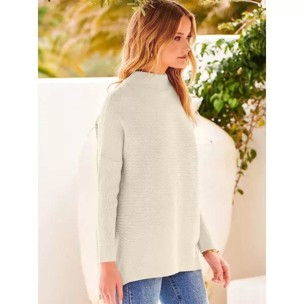imageANRABESS Womens Turtleneck Oversized Long Batwing Sleeve High Low Spilt Hem Knit Pullover Sweater TopsApricot