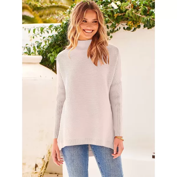 imageANRABESS Womens Turtleneck Oversized Long Batwing Sleeve High Low Spilt Hem Knit Pullover Sweater TopsPink