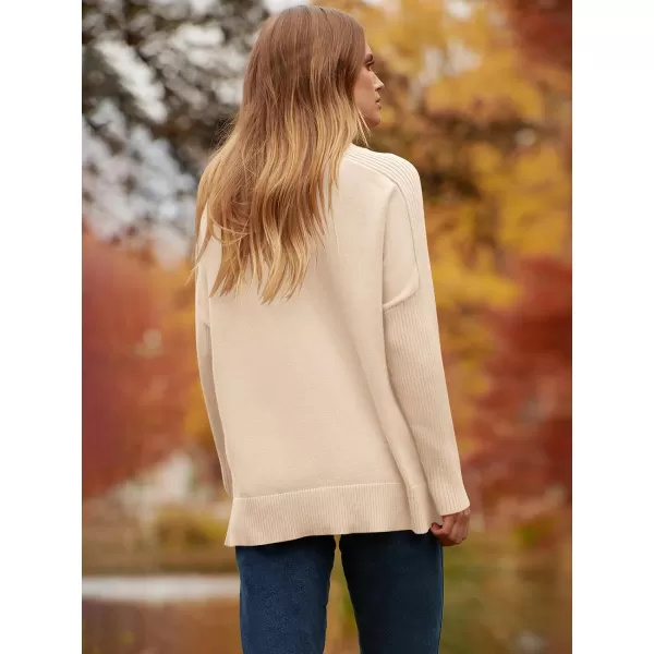 imageANRABESS Womens Turtleneck Oversized Sweaters 2023 Fall Long Sleeve Knit Split Hem Tunic Pullover TopsApricot
