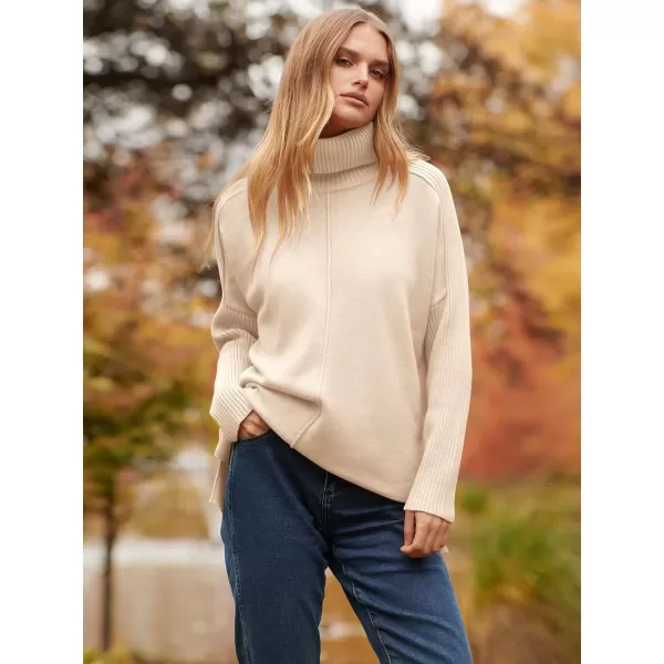 imageANRABESS Womens Turtleneck Oversized Sweaters 2023 Fall Long Sleeve Knit Split Hem Tunic Pullover TopsApricot