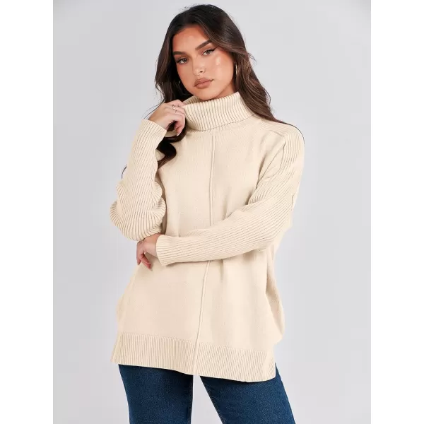imageANRABESS Womens Turtleneck Oversized Sweaters 2023 Fall Long Sleeve Knit Split Hem Tunic Pullover TopsApricot