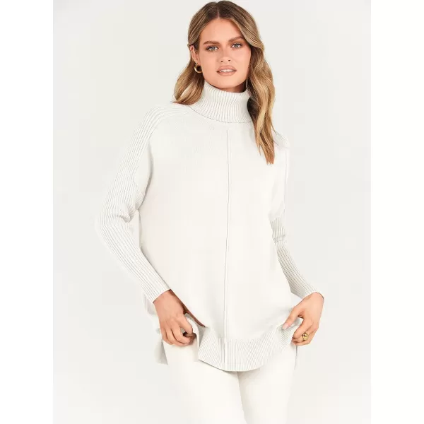 imageANRABESS Womens Turtleneck Oversized Sweaters 2023 Fall Long Sleeve Knit Split Hem Tunic Pullover TopsWhite