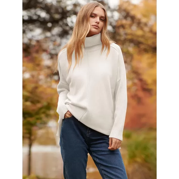 imageANRABESS Womens Turtleneck Oversized Sweaters 2023 Fall Long Sleeve Knit Split Hem Tunic Pullover TopsWhite