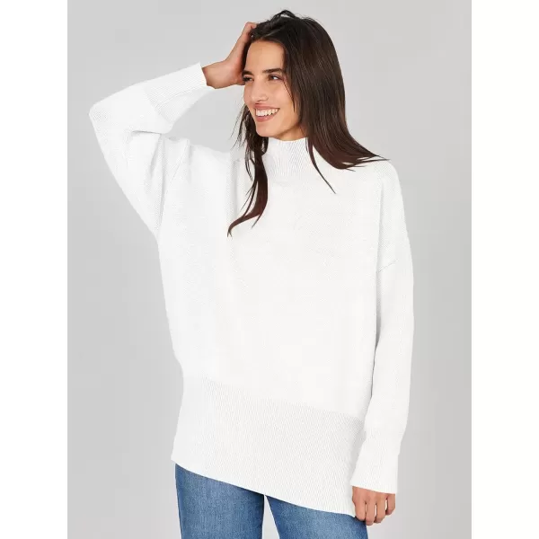 imageANRABESS Womens Turtleneck Oversized Sweaters Long Sleeve Chunky Side Slit Tunic Pullover Sweater Knit TopsWhite