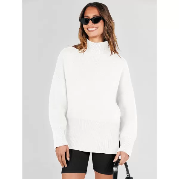 imageANRABESS Womens Turtleneck Oversized Sweaters Long Sleeve Chunky Side Slit Tunic Pullover Sweater Knit TopsWhite