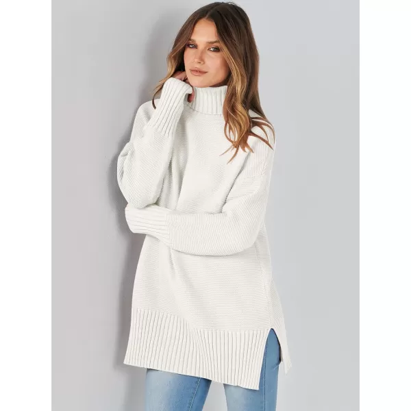 imageANRABESS Womens Turtleneck Sweaters Oversized Long Sleeve Split Hem Chunky Knit Casual Pullover Sweater Tops JumperWhite