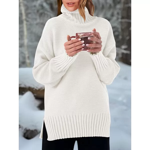 imageANRABESS Womens Turtleneck Sweaters Oversized Long Sleeve Split Hem Chunky Knit Casual Pullover Sweater Tops JumperWhite