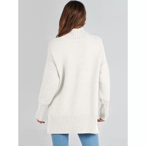 imageANRABESS Womens Turtleneck Sweaters Oversized Long Sleeve Split Hem Chunky Knit Casual Pullover Sweater Tops JumperWhite