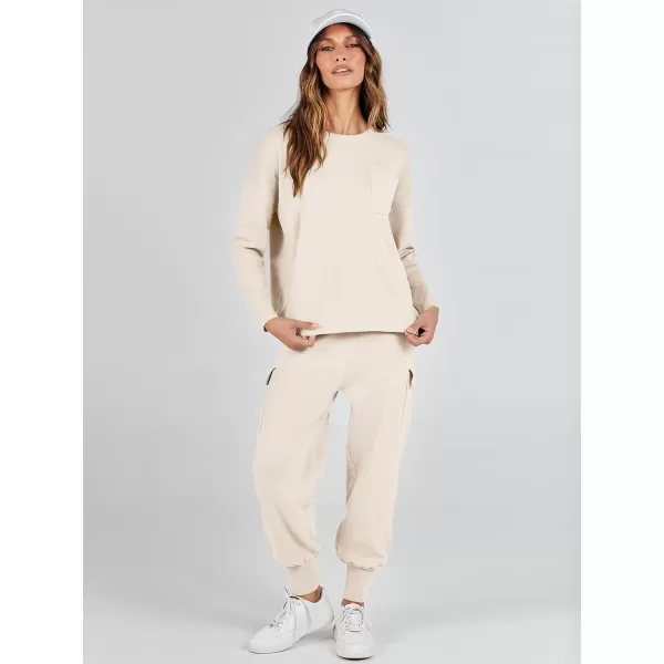 imageANRABESS Womens Two Piece Outfits Knit Sweater Sets Long Sleeve Pullover Tops Cargo Jogger Pants Lounge Matching SetsApricot