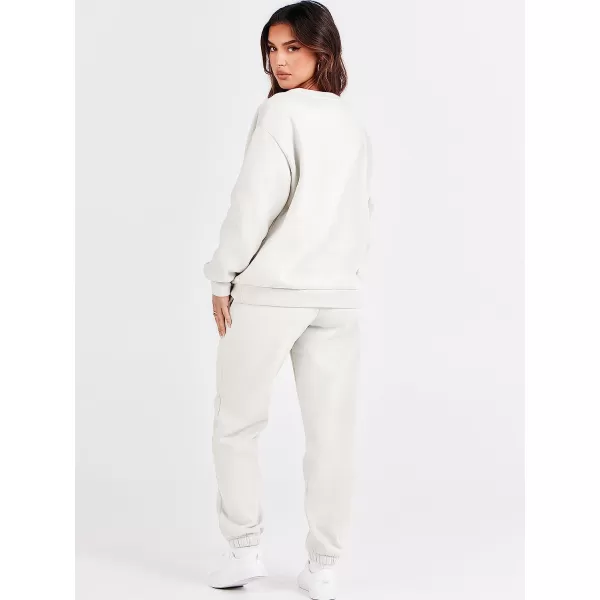 imageANRABESS Womens Two Piece Outfits Long Sleeve Crewneck Sweatsuit with Jogger Pants Lounge Sets with PocketsWhite