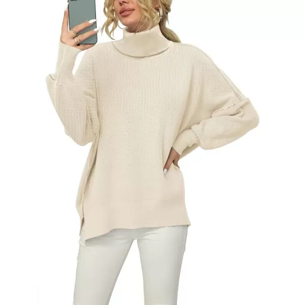 imageANRABESS Women Turtleneck Batwing Sleeve Oversized Side Slit Ribbed Knit Pullover Sweater TopApricot