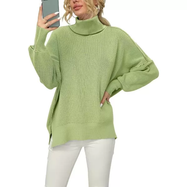 imageANRABESS Women Turtleneck Batwing Sleeve Oversized Side Slit Ribbed Knit Pullover Sweater TopPea