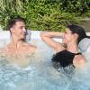 imageBestway SaluSpa Fiji AirJet Inflatable Hot Tub with 120 Soothing Jets with Set of 2 Pool and Spa Seat and 2 Padded Headrest Pillows Gray