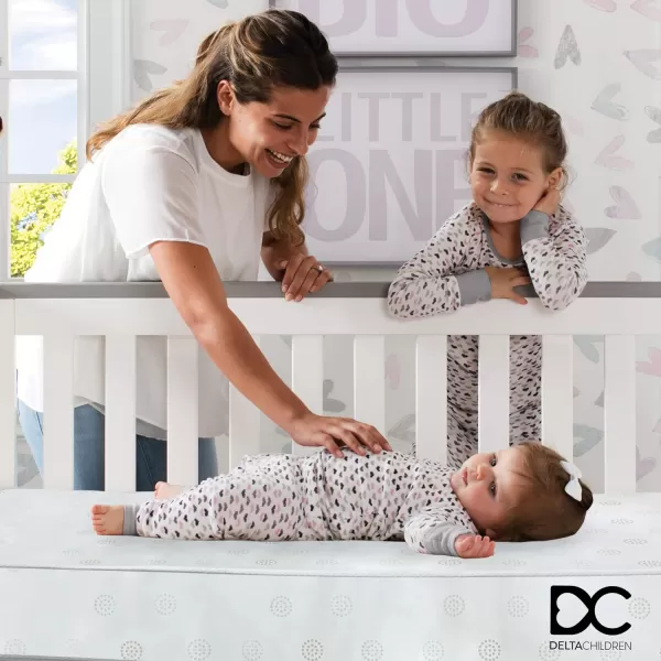 Essex 4-in-1 Convertible Baby Crib, Bianca White with Natural Legs