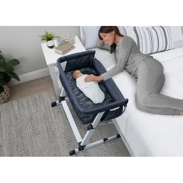 GAP babyGap Whisper Bedside Bassinet Sleeper with Breathable Mesh and Adjustable Heights - Lightweight Portable Crib - Made with Sustainable Materials, Navy Camo