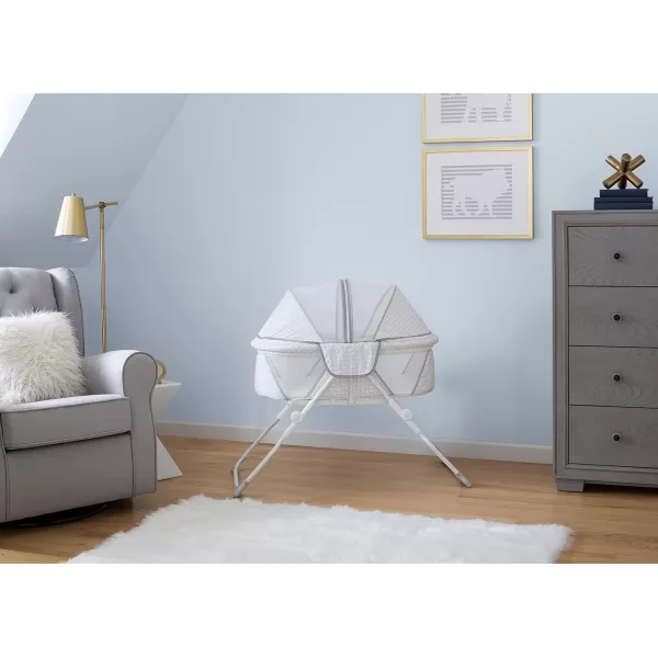 Delta Children EZ Fold Ultra Compact Travel Bedside Bassinet - Folding Portable Crib with Removable Canopy, Inner Circle )