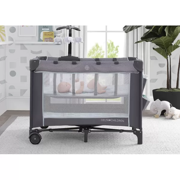 Delta Children LX Deluxe Portable Baby Play Yard With Removable Bassinet and Changing Table, Eclipse