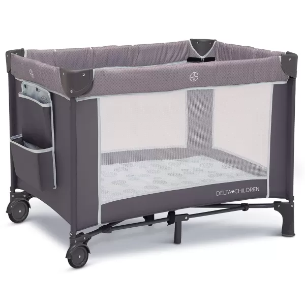 Delta Children LX Deluxe Portable Baby Play Yard With Removable Bassinet and Changing Table, Eclipse
