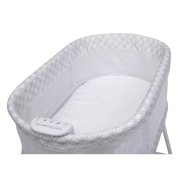 Delta Children Sweet Dreams Bassinet with Airflow Mesh Bedside Portable Crib with Vibration Lights and Music, Grey Infinity