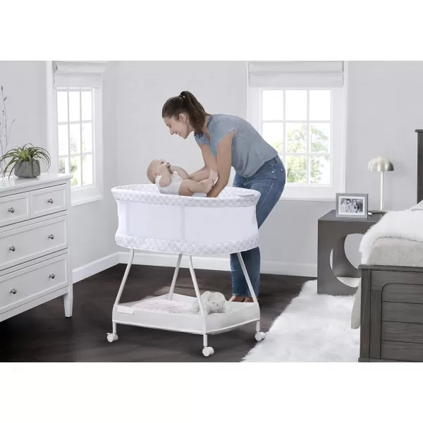 Delta Children Sweet Dreams Bassinet with Airflow Mesh Bedside Portable Crib with Vibration Lights and Music, Grey Infinity