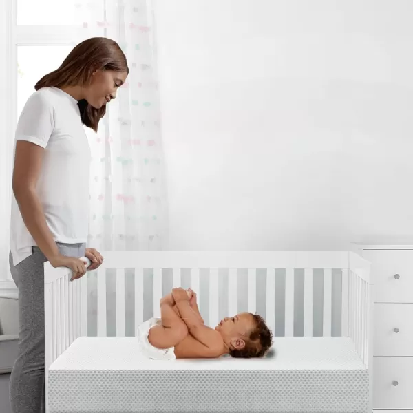 Delta Children Twinkle Stars Breathable 4-inch Mini Crib Mattress with Removable/Machine Washable Cover - GREENGUARD Gold – Waterproof - Sustainably Sourced Core Fiber Core, Pink