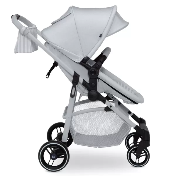GAP babyGap 2-in-1 Carriage Stroller - Car Seat Compatible - Easy One-Handed Fold - Lightweight Stoller with Oversized Canopy &amp; Reclining Seat - Made with Sustainable Materials, Black Camo