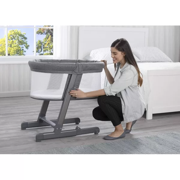 Simmons Kids Oval City Sleeper Bedside Bassinet - Adjustable Height Portable Crib with Wheels &amp; Airflow Mesh, Grey Tweed 31.5x19.7x30 Inch 