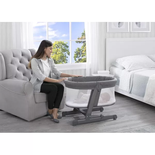 Simmons Kids Oval City Sleeper Bedside Bassinet - Adjustable Height Portable Crib with Wheels &amp; Airflow Mesh, Grey Tweed 31.5x19.7x30 Inch 