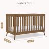 imageDelta Children Essex 4in1 Convertible Baby Crib Bianca White with Natural LegsChestnut