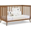 imageDelta Children Essex 4in1 Convertible Baby Crib Bianca White with Natural LegsChestnut