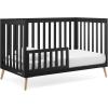 imageDelta Children Essex 4in1 Convertible Baby Crib Bianca White with Natural LegsEbony