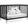 imageDelta Children Essex 4in1 Convertible Baby Crib Bianca White with Natural LegsEbony