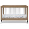 imageDelta Children Sloane 4in1 Acrylic Convertible Crib  Includes Conversion Rails Bianca White wMelted BronzeAcornMatte Black
