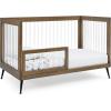 imageDelta Children Sloane 4in1 Acrylic Convertible Crib  Includes Conversion Rails Bianca White wMelted BronzeAcornMatte Black