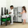 imageDelta Children Gourmet AllinOne Corner Play Kitchen  Toy Kitchen Playset with Safe ampamp Heatless Stove with Lights Oven Sink FridgeFreezer with Ice Maker and 20 Accessories NaturalWhiteGrey