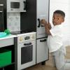 imageDelta Children Gourmet AllinOne Corner Play Kitchen  Toy Kitchen Playset with Safe ampamp Heatless Stove with Lights Oven Sink FridgeFreezer with Ice Maker and 20 Accessories NaturalWhiteGrey