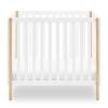 imageDelta Children Gio Mini Crib with 275quot Mattress Included EbonyNaturalBianca WhiteNatural