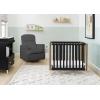 imageDelta Children Gio Mini Crib with 275quot Mattress Included EbonyNaturalEbonyNatural