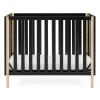imageDelta Children Gio Mini Crib with 275quot Mattress Included EbonyNaturalEbonyNatural