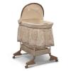 imageDelta Children Rocking Bedside Bassinet  Portable Crib with Lights Sounds and Vibrations Play Time JungleBassinet