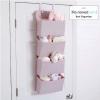 imageDelta Children 4 Pocket Over The Door Hanging Organizer Easy StorageOrganization Solution  Versatile and Accessible in Any Room in the House BeigePink