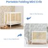 imageDelta Children Mia Portable Folding Mini Crib with 15Inch Mattress  Greenguard Gold Certified Bianca WhiteNaturalBianca WhiteNatural