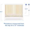 imageDelta Children Mia Portable Folding Mini Crib with 15Inch Mattress  Greenguard Gold Certified Bianca WhiteNaturalBianca WhiteNatural